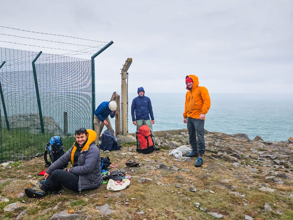 Rock climbers at the cliff-top, Saddle Head, Pembrokeshire