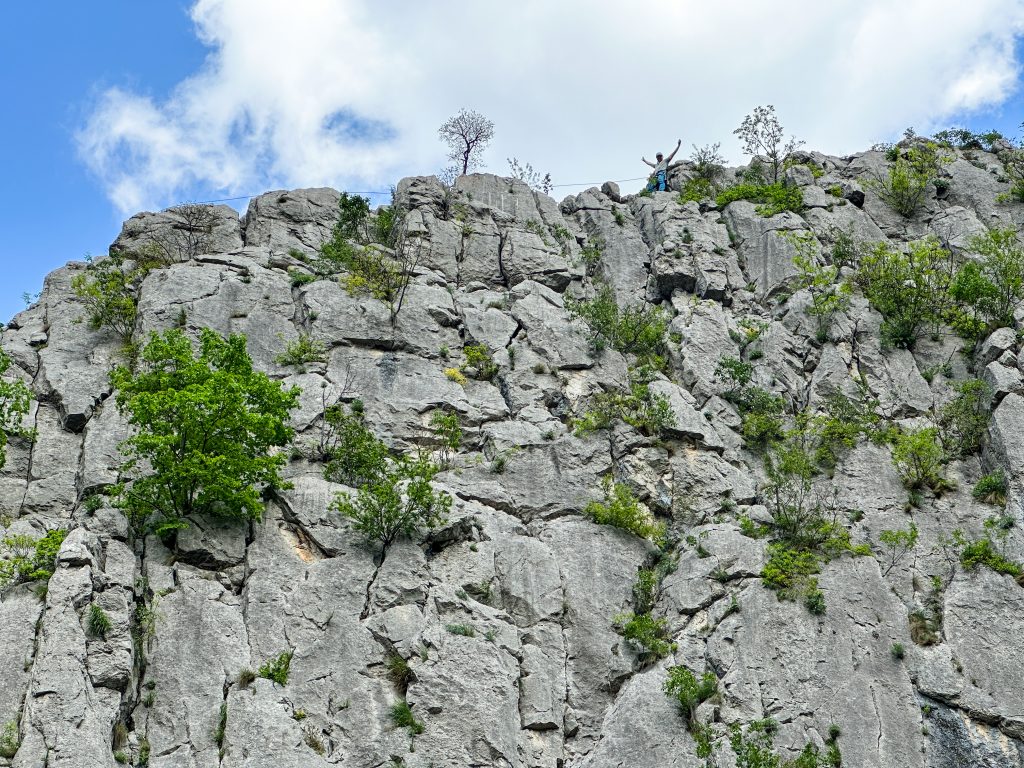 Climber at the top of a route, Vratsa, Bulgaria