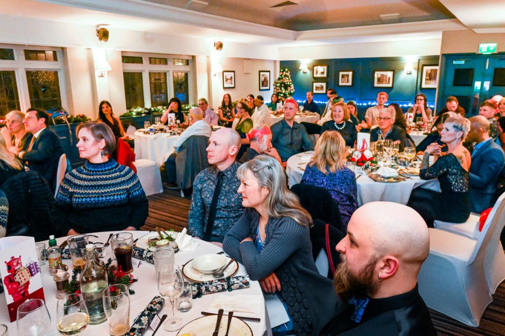 Wide angle photo of seated guests at SMC annual dinner