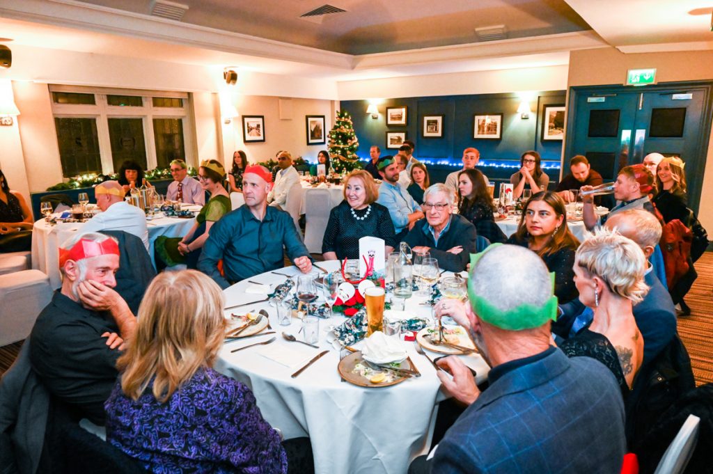 Wide angle photo of seated guests at SMC annual dinner
